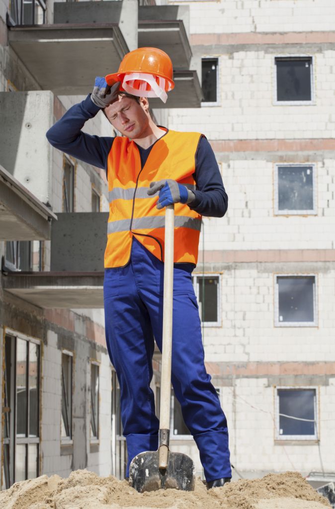 Exhausted construction worker